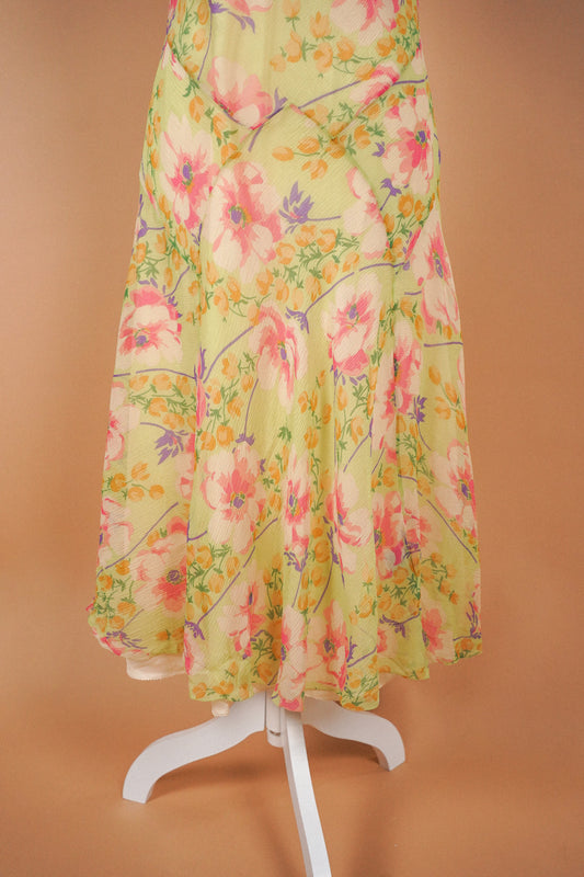 Ralph Lauren Vintage Silk Green Floral Dress — Close-up of the flared floral skirt