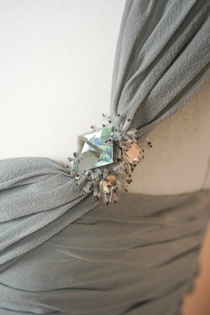 Valentino Dove Grey Silk One-Shoulder Dress — Close-up of the crystal shoulder embellishment