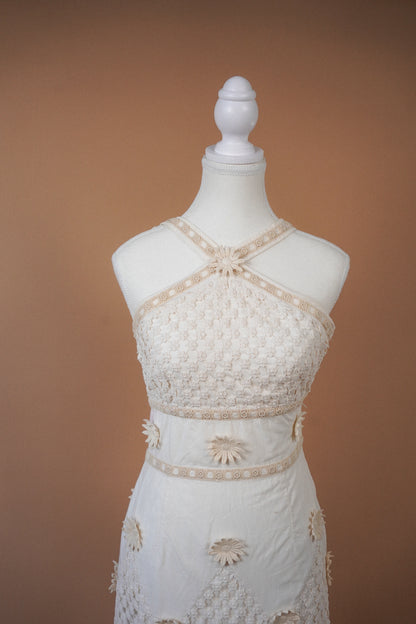 Moschino Cheap and Chic Ivory Floral Crochet Daisy Mini Dress — Close-up of the crossed halterneck and bodice