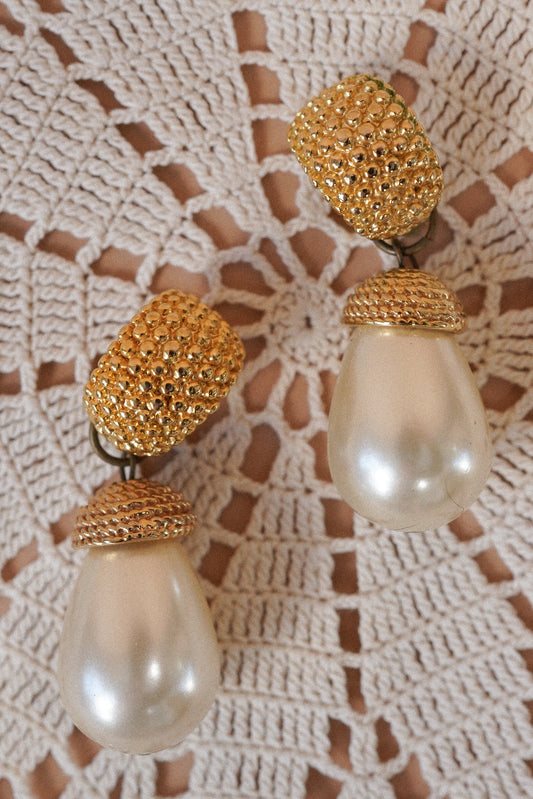 Vintage Oversized Faux Pearl Drop Clip-On Earrings — Close-up of gold-tone tops and pearl drops